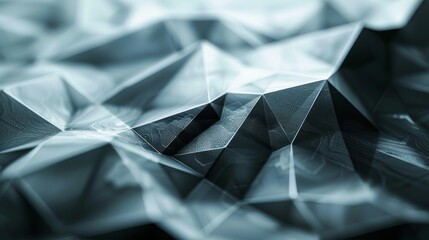Low poly triangular shapes creating a futuristic, abstract and geometric surface, ideal for technology and innovation related concepts