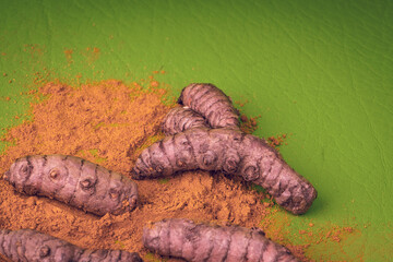 Curcuma longa - Turmeric is a very healthy species in spoon and bowl