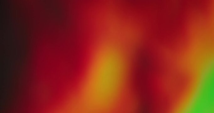 Multicolored film flare. Blurred glowing ray. Defocused leak green yellow rays rainbow flickers beam gradient lens on abstract art light background.