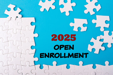 Business, management and administration concept. 2025 OPEN ENROLLMENT written on blue background.