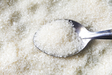 spoon full of granulated sugar
