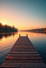 Fototapeta premium Warm sunset colors on a wooden dock at a lake, green, pink