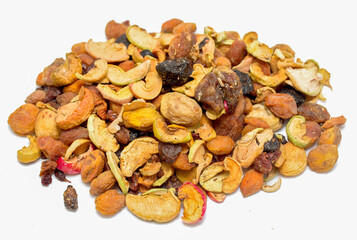 A pile of nuts and dried fruit on a white background