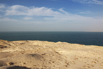 Landscape of Sahara desert with Atlantic ocean meets, Mauritania, West Africa