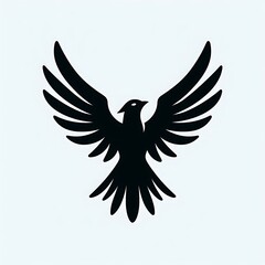 Fototapeta premium Black silhouette of a bird in flight with wings spread.