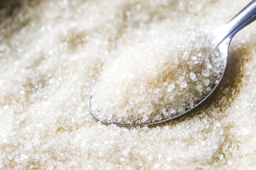 spoon full of granulated sugar