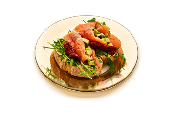 A plate of food with a sandwich and a salad