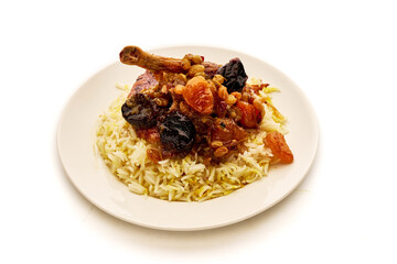 A plate of food with rice and meat on it