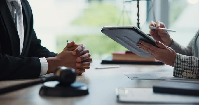 Hands, attorney and meeting with tablet in office, writing and review with compliance at company. People, lawyer and touchscreen with consultation, application and e signature at corporate law firm