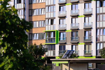 Obraz premium Elements of architectural decorations of buildings, modern windows, walls and balconies.