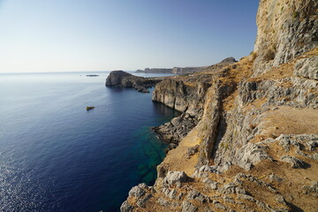 rocky cliffs  around the Acropolis of Lindos