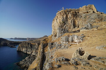 rocky cliffs  around the Acropolis of Lindos