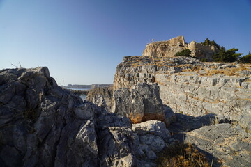 rocky landscape of Lindos , coastline around the Acropolis