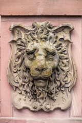 Lion's head statue on the exterior of the Heidelberg castle, Heidelberg, Germany