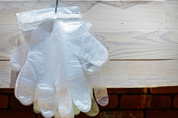 chewing candies and disposable gloves for self-service in the supermarket