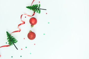 Christmas ornament in the form of decorative Christmas trees on white. Top view, space for text.