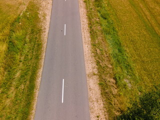 Fototapeta premium Top view of the roads, landscape and roadside from the height of a flying drone. 