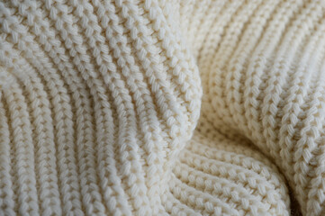 cozy knitted fabric fashion clothing brand knitwear sweaters winter accessories texture home living fall tips quality sustainable eco-friendly recycling upcycling environmentally conscious background