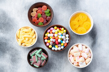 Mix of colorful candies . Top view