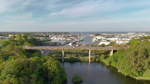 bridge in concarneau le moros over port with view of the ocean and cars on the bridge