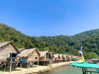 Moken people's village, souvenir shops, houses along the beach in Surin island 