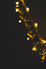 Big boom crane with light lights in the dark