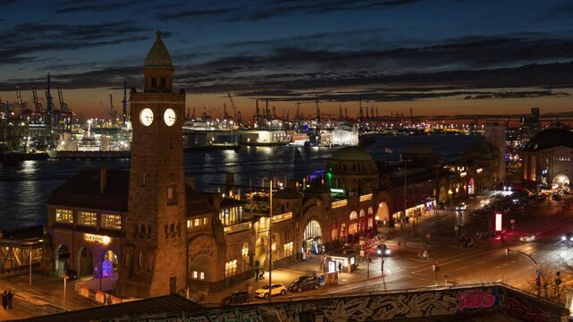 Hamburg, Germany: 4k Time lapse: St. Pauli Landungsbruecken and Hamburg harbor at night