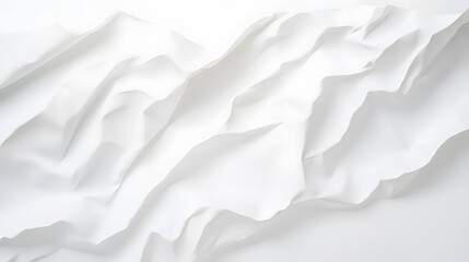 Obraz premium Crumpled piece of white paper on white background. Top view