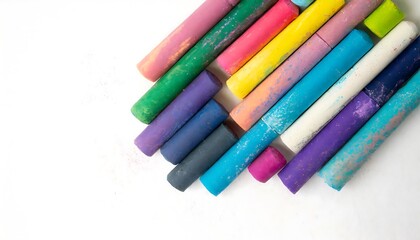 Fototapeta premium Vibrant Pastel Chalks Arranged on a White Background – Artistic and Creative Supplies