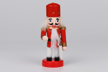 Festive Wooden Nutcracker with Original Hair Against a Bright White Backdrop