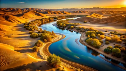 Aerial Tilt-Shift Photography of a Serene River Flowing Through a Golden Desert Landscape, Highlighting Nature's Beauty and the Contrast of Water and Sand Dunes