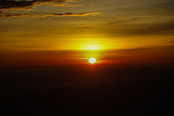 Sunset over mountain range nature photography horizon view peaceful atmosphere beauty of dusk light