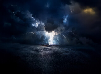 A dramatic, dark landscape is illuminated by intense lightning striking from a stormy sky.  The scene evokes feelings of power and awe.