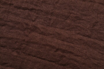 Brown fabric background, top view