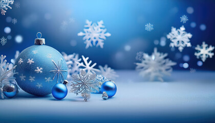 Blue christmas ornaments and snowflakes on a wintry background