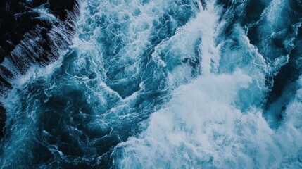 Naklejka premium Abstract Aerial View of Waterfall with Bright Blue and White Water