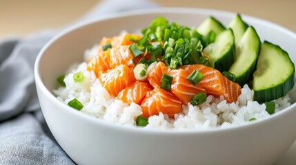 Fresh Salmon Sushi Bowl with Rice, Cucumber and Green Onion Garnish