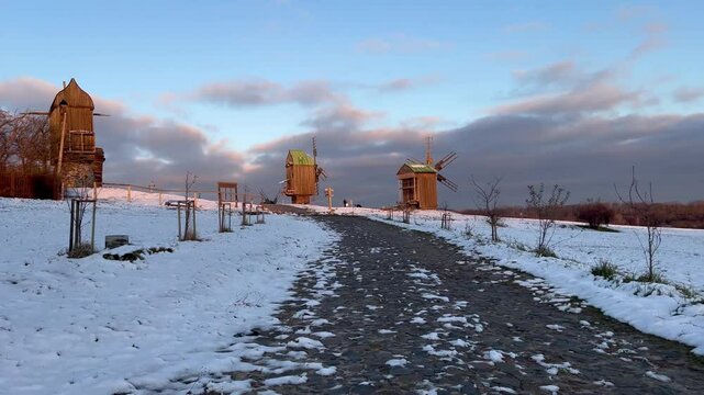 Winter landscape in an old village. The Pyrohiv Historical Museum in Kyiv, Ukraine. 