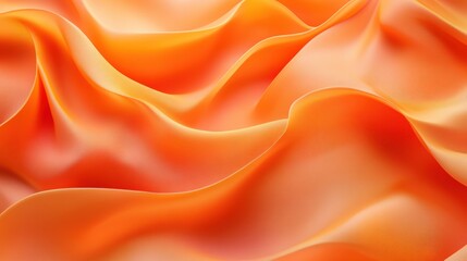 Obraz premium Vibrant orange silk fabric with elegant waves and folds, creating a sense of fluidity and luxury.