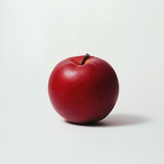 Single red apple on white background.
