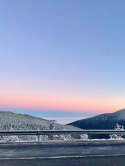 A sunset in a snowy landscape located in Spain