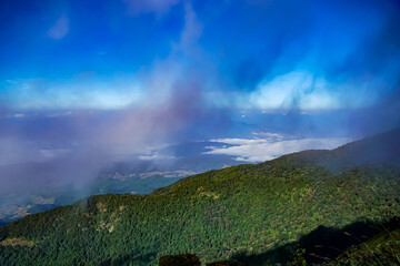 Breathtaking cloudscape overrolling mountains scenic viewpoint nature photography serene environment travel inspiration