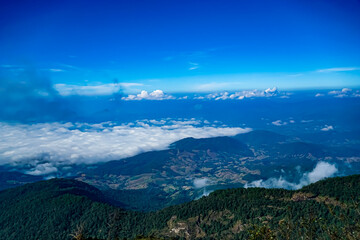 Fototapeta premium Breathtaking mountain view overlooking clouds scenic landscape nature photography majestic environment aerial perspective serenity