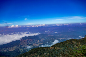 Breathtaking mountain view amidst clouds scenic landscape nature photography aerial perspective tranquil atmosphere