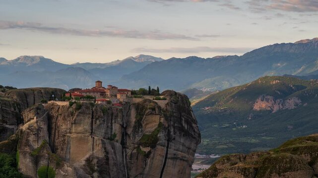 Time lapse with a spectacular view of the Holy Trinity Monastery in Meteora in the morning light - Тhessaly, Greece