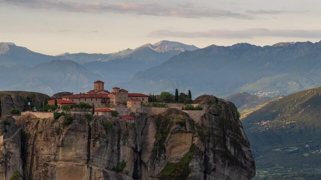 Time lapse with a spectacular view of the Holy Trinity Monastery in Meteora in the morning light - Тhessaly, Greece