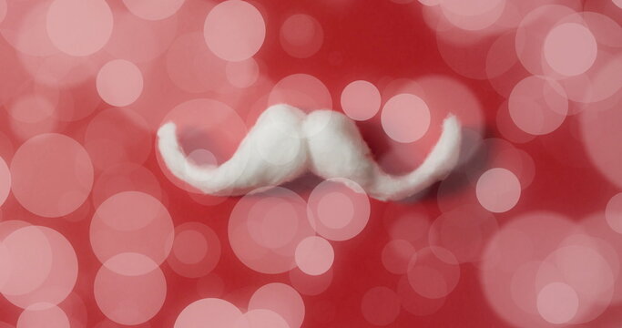 White mustache on red background with bokeh lights image - Powered by Adobe