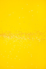 Tiny pearl stars on yellow background.