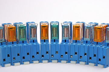 Electromagnetic relays for control in automation circuits. Close-up. Soft focus.