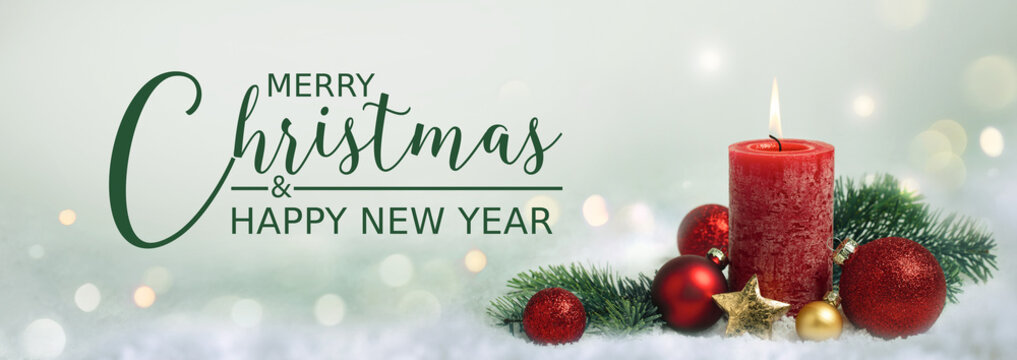 Christmas greeting card english text - Merry Christmas and happy new year - Xmas decoration with red candle, Winter background with snow and golden lights - Panorama, banner, header for advertisement 